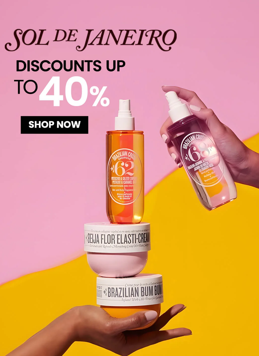 A promotional image for Sol de Janeiro beauty products, featuring body creams and sprays stacked in a balanced display on a hand. The text 