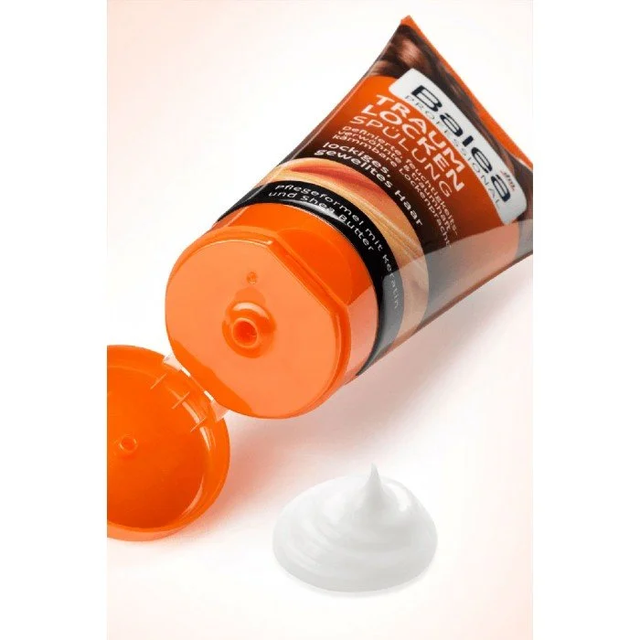 Defined, moisture-indulgent and wonderfully combable curls For curly, wavy hair Care formula with keratin and shea butter Skin compatibility dermatologically confirmed The Balea Professional Dream Curls Conditioner has | Veela Beauty Defined, moisture-indulgent and wonderfully combable curls