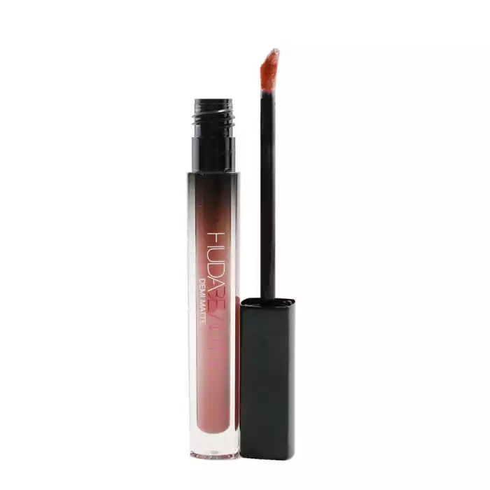 Inspired by Huda?s love for self-expression through makeup, Huda Beauty Demi Matte is a bold Cream Lipstick showcasing a full spectrum of ultra-feminine colors to complement every one of your alter egos. Saturated in pi | Veela Beauty its creamy & soft texture, gives your lips a beautiful