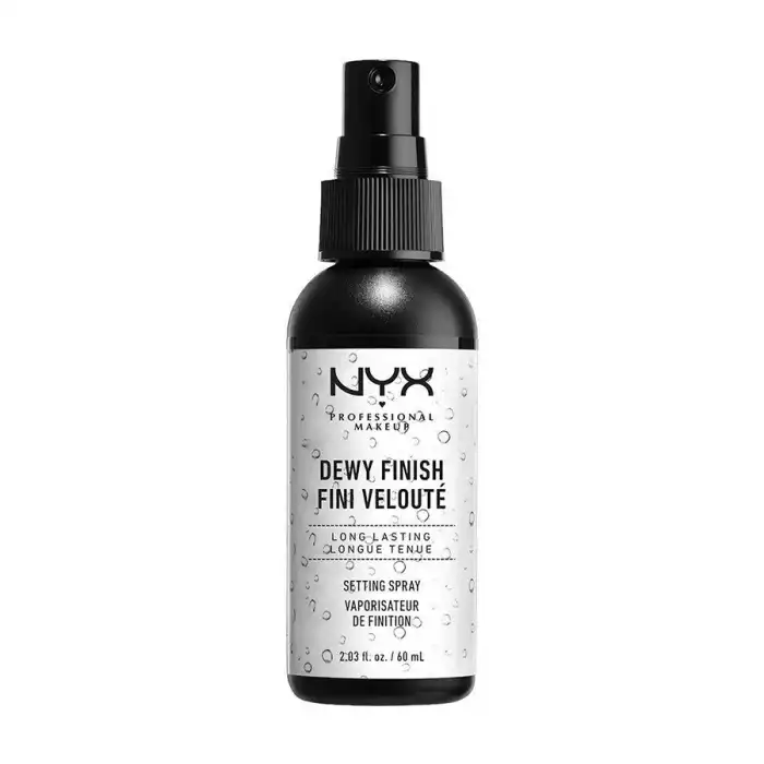 NYX Pro Makeup Dewy Finish Long Lasting Setting Spray is a finishing spray that coats your makeup with a dewiness while enhancing its longevity. The spray is lightweight and hydrating, a refreshing and uplifting step sui | Veela Beauty NYX Pro Makeup Dewy Finish Long Lasting Setting Spray is a
